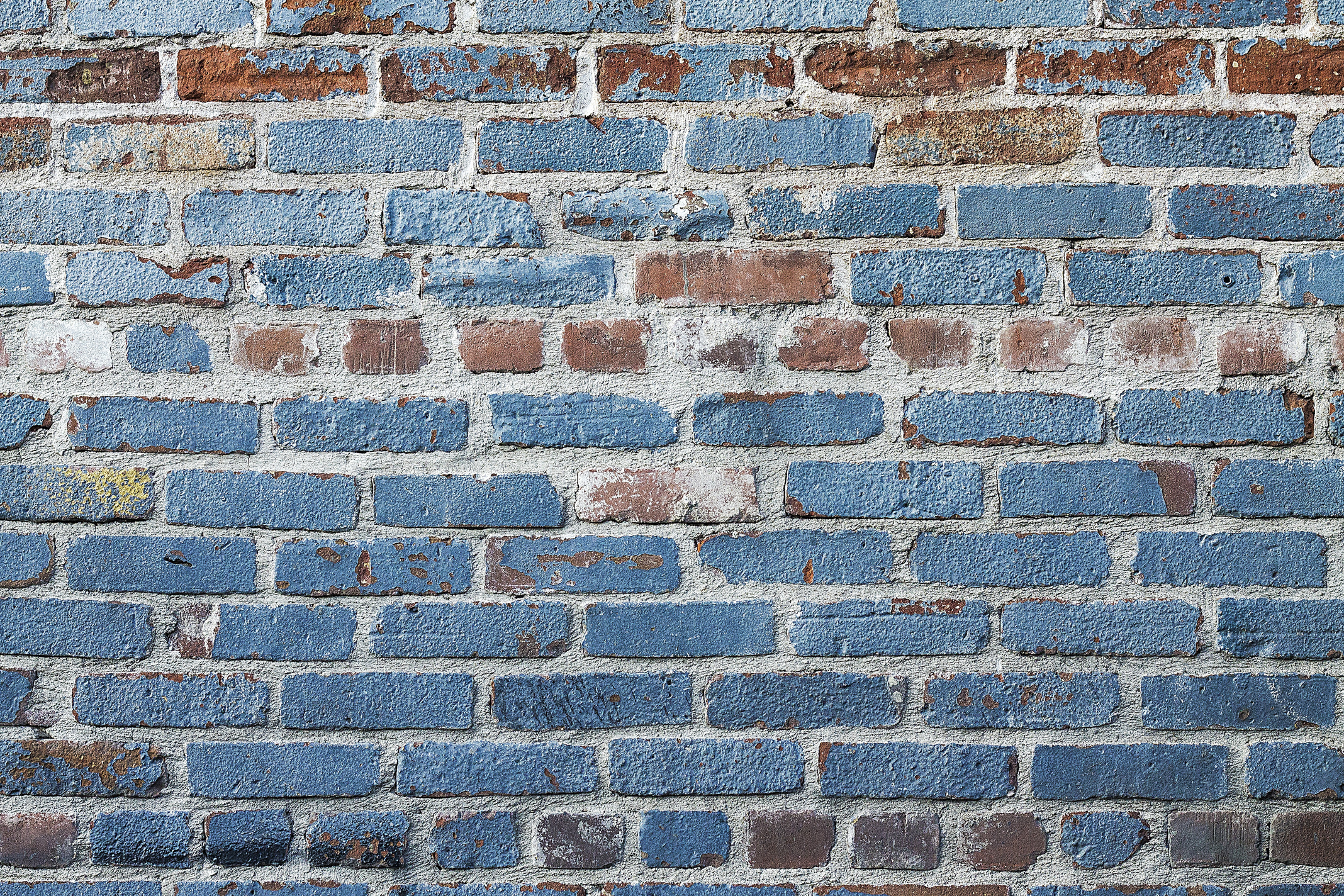 Old Brick Wall Painted in Blue